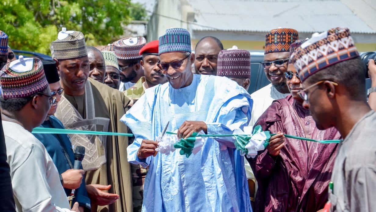 Image of President Mohammadu Buhari performing ribbon cutting at the hospital